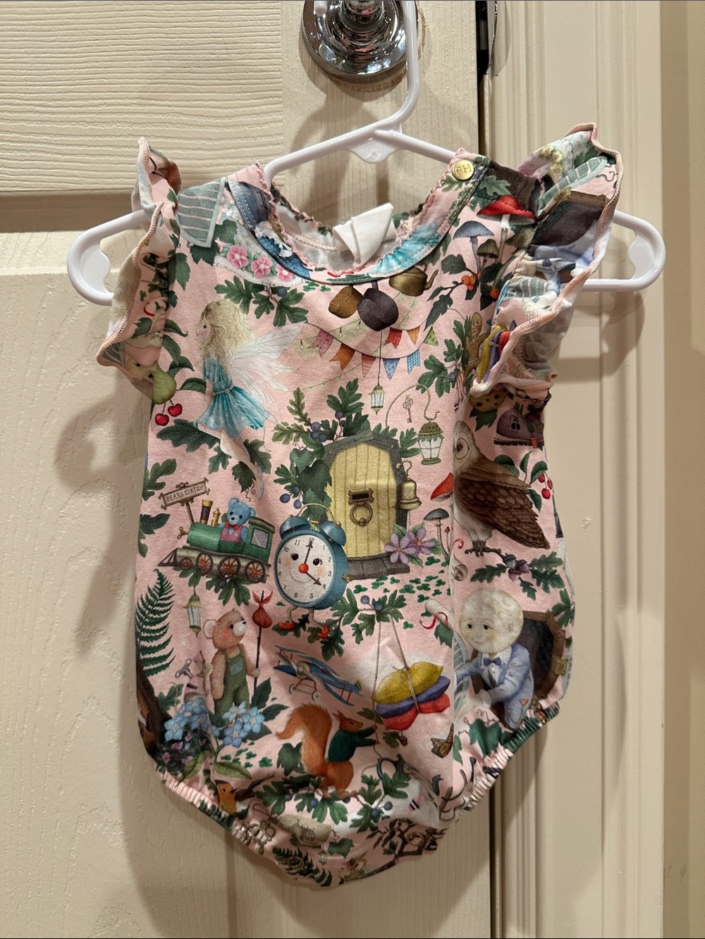 Fleur Harris- Pink Woodland Print Ruffle Sleeve Baby Romper